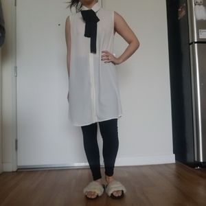 Sleeveless collared tunic with bow tie